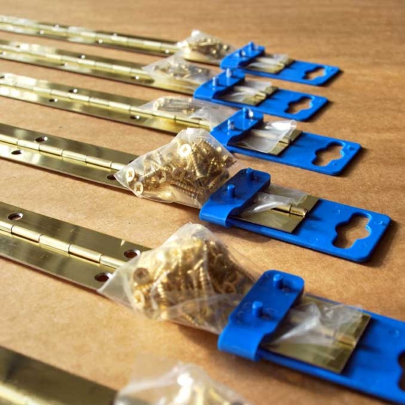 Afbeeldingen van Pianoscharnier ZB 32x0,7x1500mm MESSING